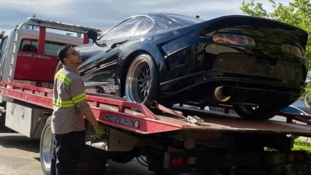 Neptune Towing team with tow truck in Tulsa